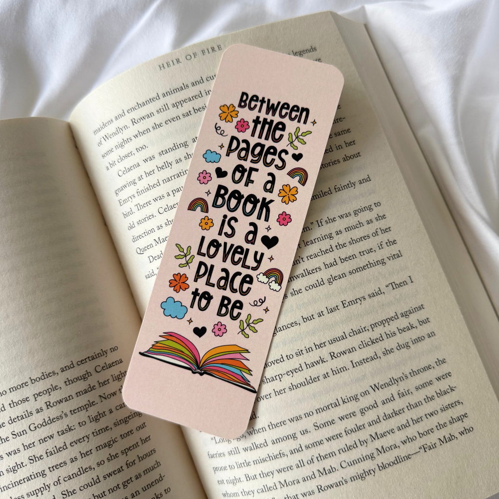 BETWEEN THE PAGES OF A BOOK IS A LOVELY PLACE TO BE BOOKMARK