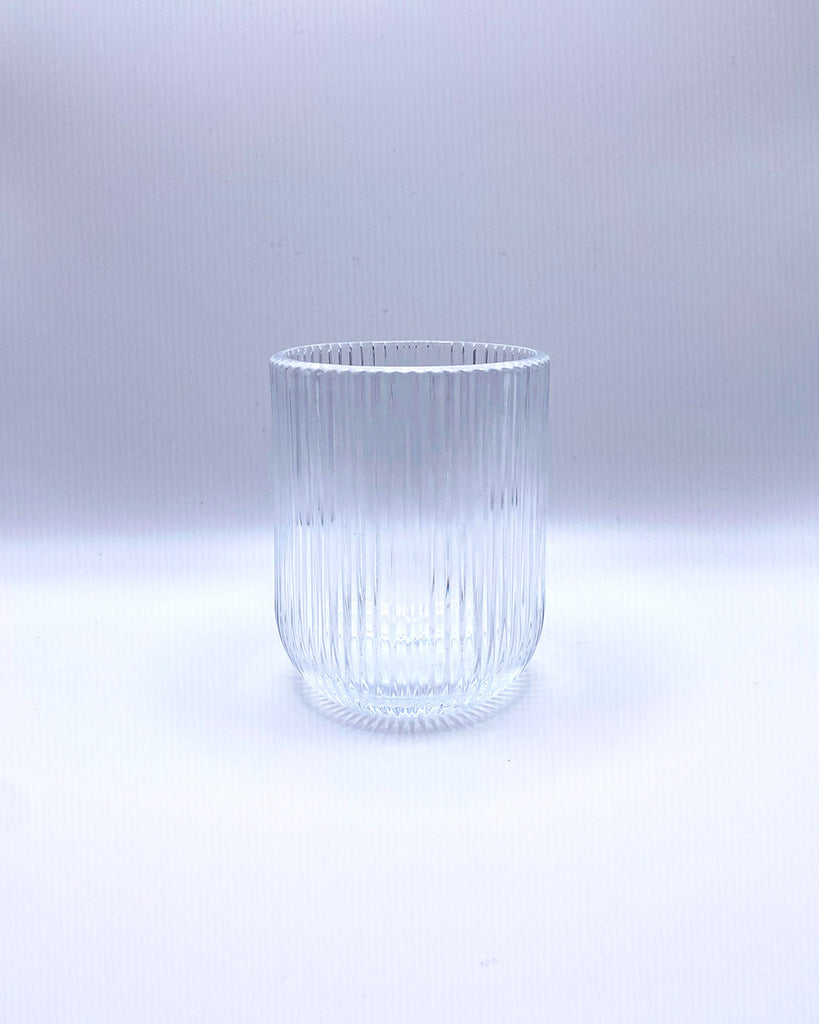 CURVED RIBBED GLASS CUP