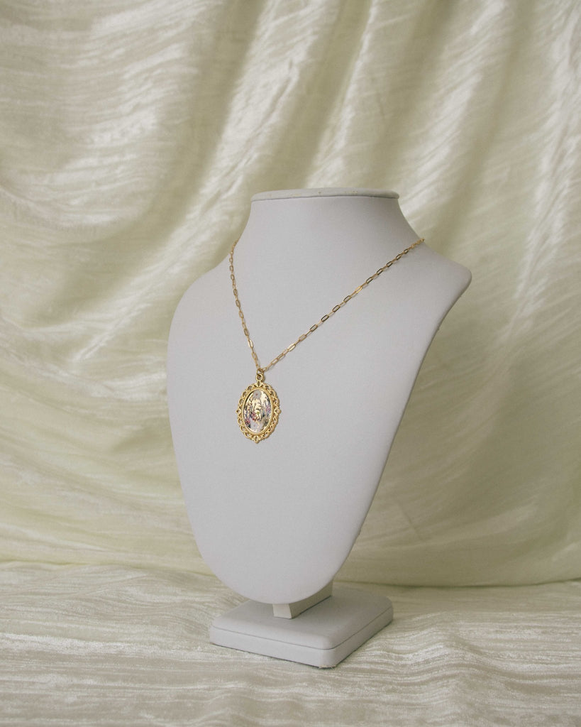 64fa7464983fea3f4f05e5c2_antique-gold-floral-resin-necklace-2-_1772329160085.jpg