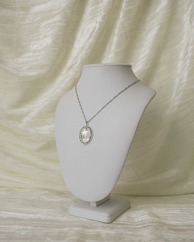 64fa7464983fea3f4f05e5c2_antique-silver-floral-resin-necklace_1772329681455.jpg