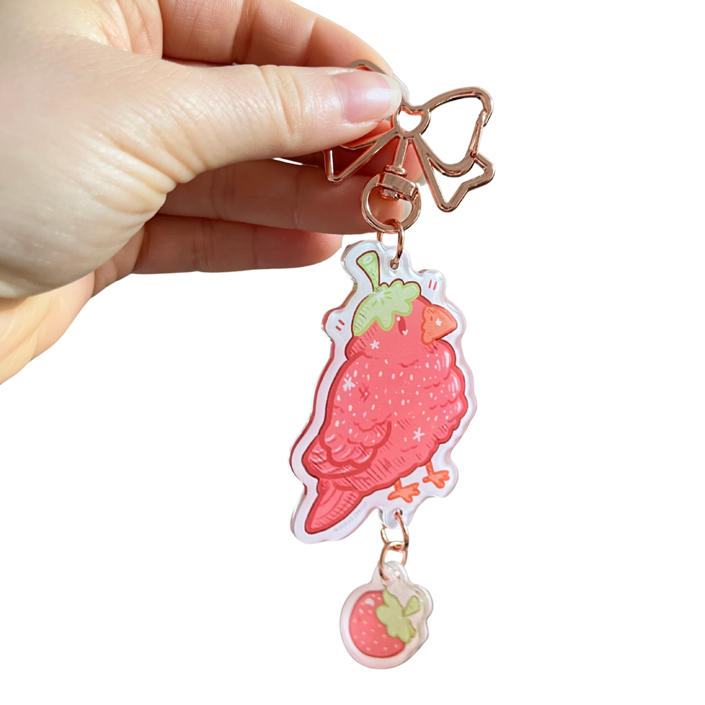 64fa7464983fea3f4f05e5c2_strawberry-finch-keychain_1776741011749.png